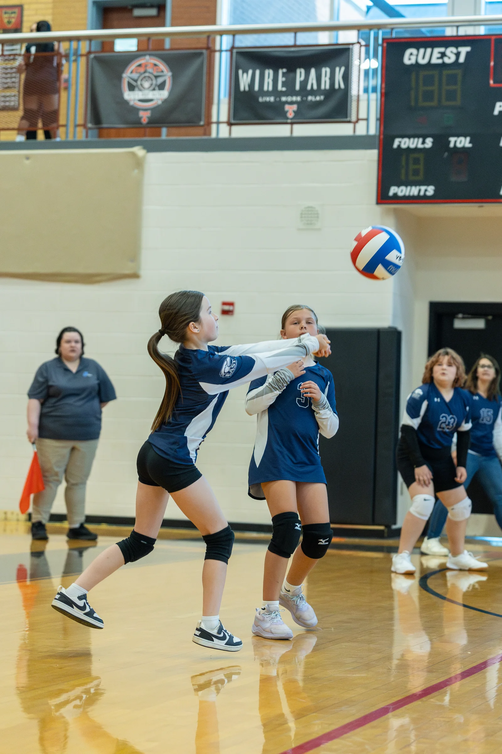 A player digs a pass off the serve